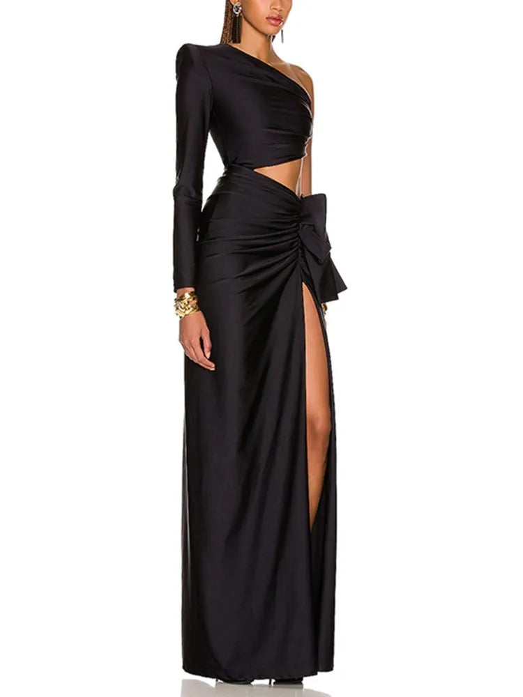 Black long sleeved hollowed out waist open stretch dress with sloping shoulders