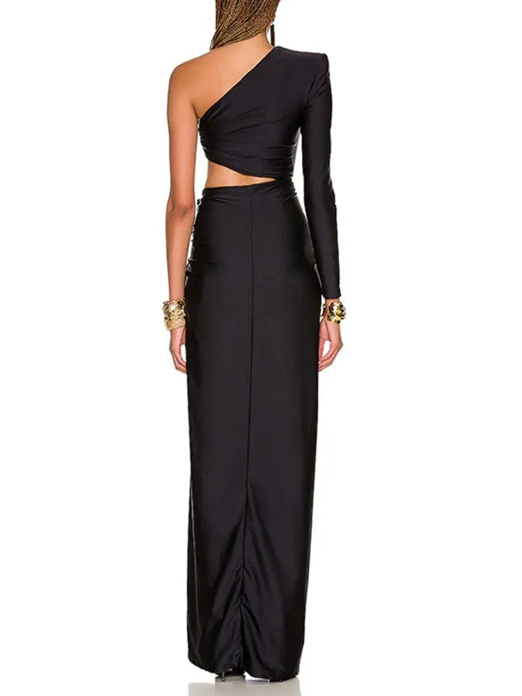 Black long sleeved hollowed out waist open stretch dress with sloping shoulders