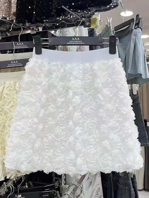 White high waisted three-dimensional rose decoration short skirt A-line hip hugging short skirt